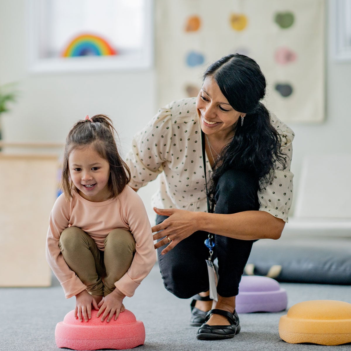 Child educator helps child balance